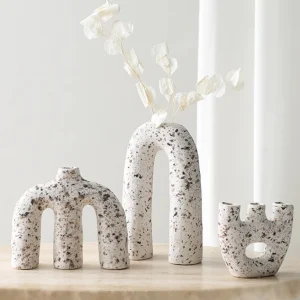 Minimalist, modern, creative, light luxury, abstract, irregular ceramic vase for home showrooms, hotels, and clubs.